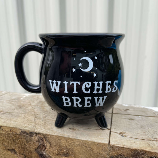 Black Cauldron shaped mug with "Witches Brew" in white text.