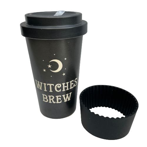 Black Bamboo Eco Travel Mug with white font saying "Witches Brew" on it and a silicone band sitting next to it.