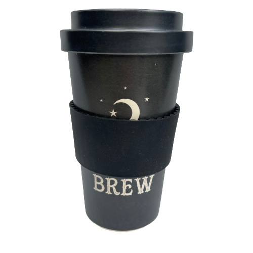Black Bamboo Eco Travel Mug with white font saying "Witches Brew" on it and a silicone black band around it.