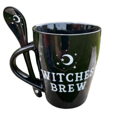 Witches brew mug in black with matching spoon.