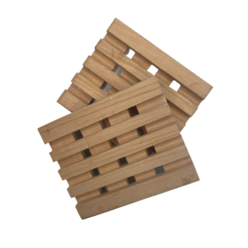 Two wooden soap dishes.