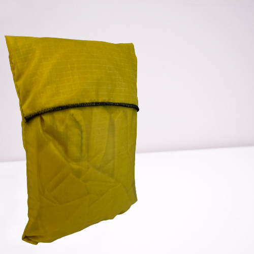 Yellow folded up tote bag made from parachutes.