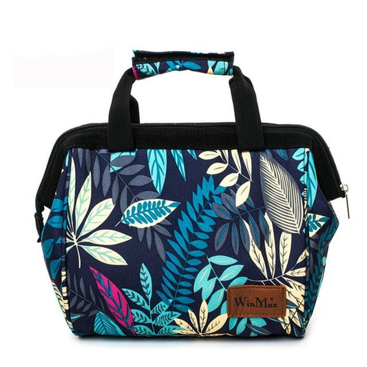 Winmax Cooler bag in navy blue with teal, grey and pink foliage print.