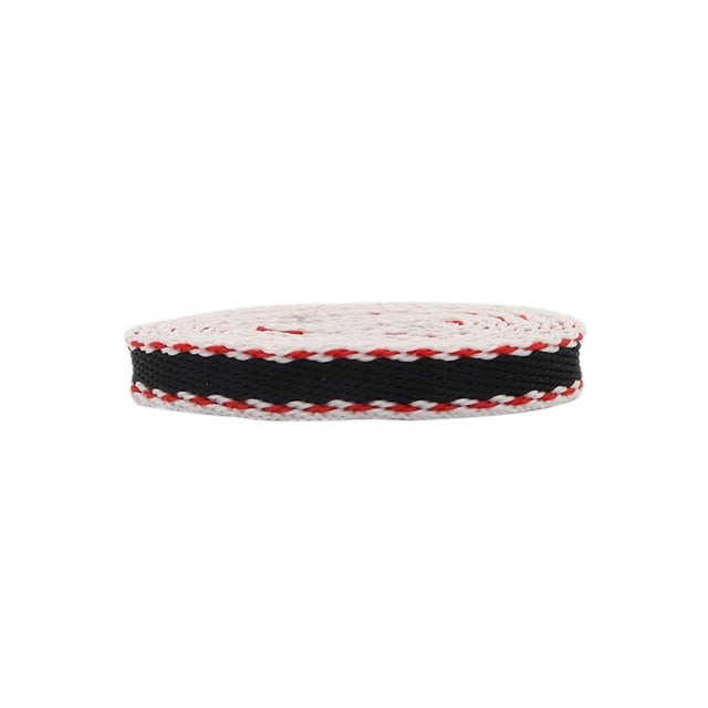 Black shoelaces with red and white edging.